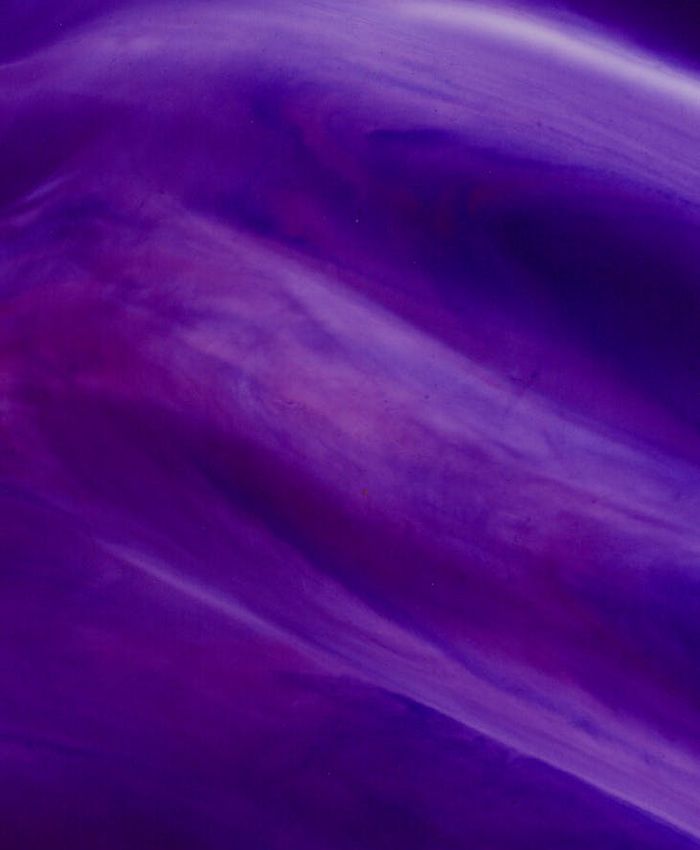 Abstract violet waves representing movement and balance of energy