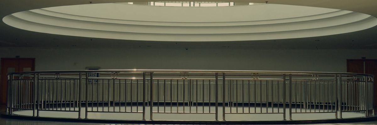 Futuristic violet abstract landscape with light lines and arcs